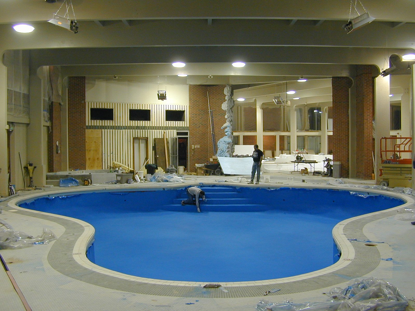 Skid-resistant deck coating on an exposed platform
