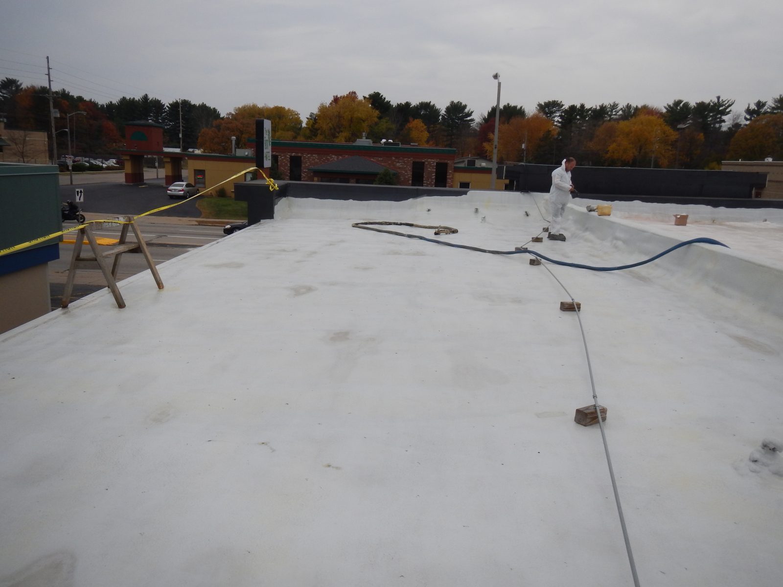 Steel deck coated with seamless polyurea membrane